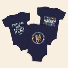 Load image into Gallery viewer, Three navy onesies featuring cross stitch style prints of Bailey as well as the phrase, Dream Big, Fight Hard, and the classic Warren logo. (4407619223661) (7431626260669)
