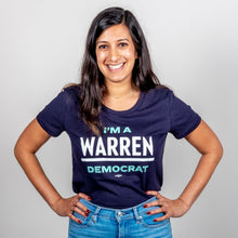Load image into Gallery viewer, I'm A Warren Democrat Fitted Navy T-Shirt with White and Liberty Green Text on smiling model. (1678479949933) (7431621443773)