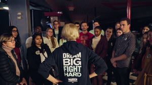 Elizabeth Warren wearing the Dream Big Fight Hard Hoodie while talking to group of voters in West Des Moines Iowa. (1506799779949) (7433842753725)