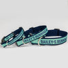 Small, medium and large sizes of the dog collars in navy and liberty green with the phrase, Bailey's Running Mate. (4166791397485)