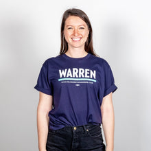 Load image into Gallery viewer, Warren Unisex T-Shirt in Navy and Green on model. (1506796044397) (7433026633917)