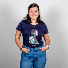 Load image into Gallery viewer, I Am Not Afraid Fitted Navy T-Shirt featuring an image of Elizabeth Warren on model with hands in pockets. (3961420611693) (7432138948797)