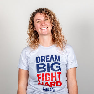 Dream Big, Fight Hard Unisex Grey T-shirt with Navy and Red print on model. (1518922596461) (7432137736381)