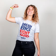 Load image into Gallery viewer, Dream Big, Fight Hard Unisex Grey T-shirt with Navy and Red print on model flexing arm. (1518922596461) (7432137736381)