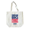 Natural colored tote with the words, dream big fight hard, stacked. 